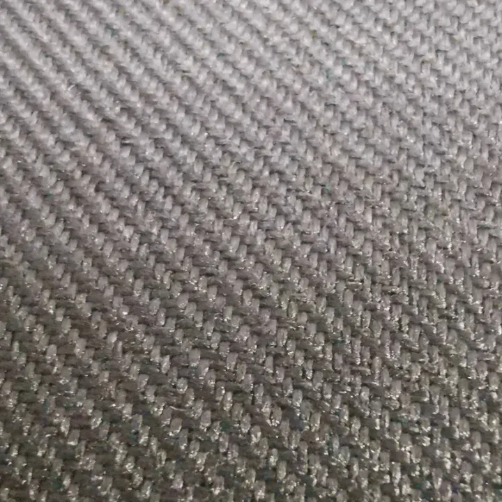 Close-up of grey textured fabric weave.