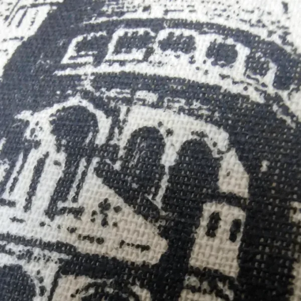 Close-up of a black and white woven fabric texture.
