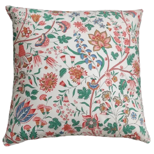 Floral pattern cushion on white background.