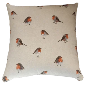 Robin-print decorative cushion on neutral background.