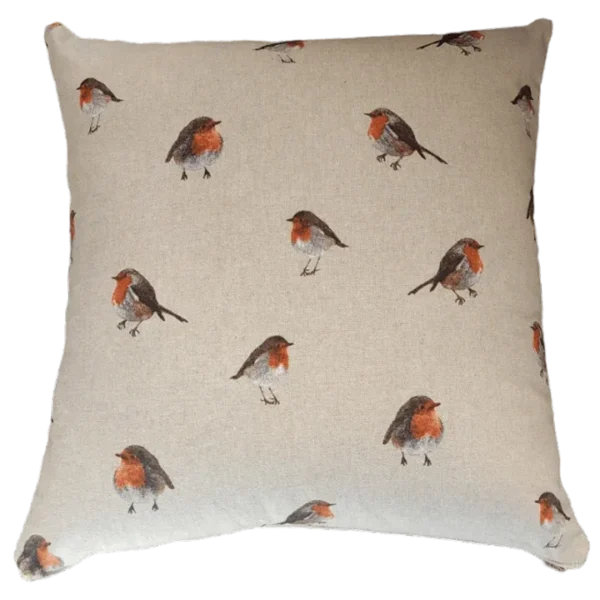 Robin-print decorative cushion on neutral background.