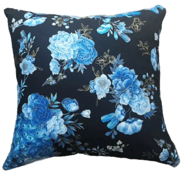 Floral blue cushion on black background.