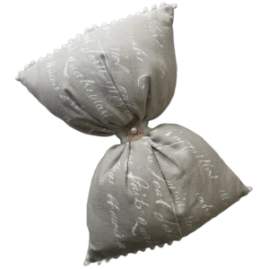 Decorative grey script-patterned knot pillow.