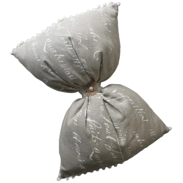 Decorative grey script-patterned knot pillow.