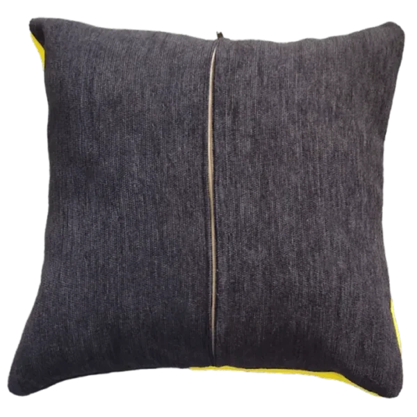 Dark grey cushion with yellow zipper detail on black.