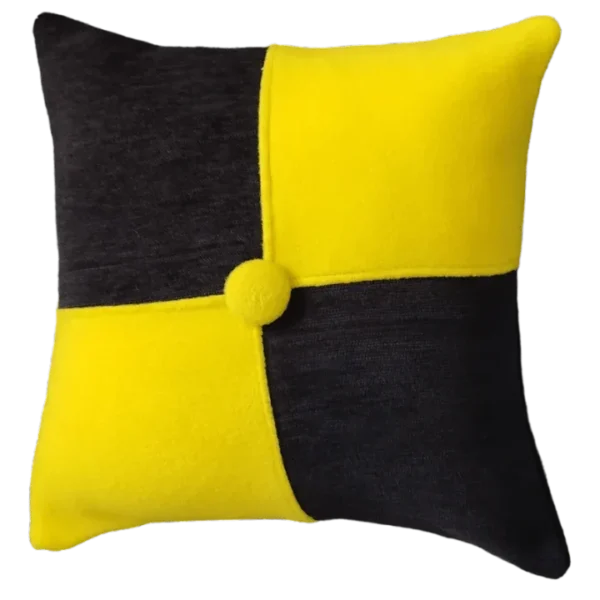 Black and yellow decorative cushion on white background.